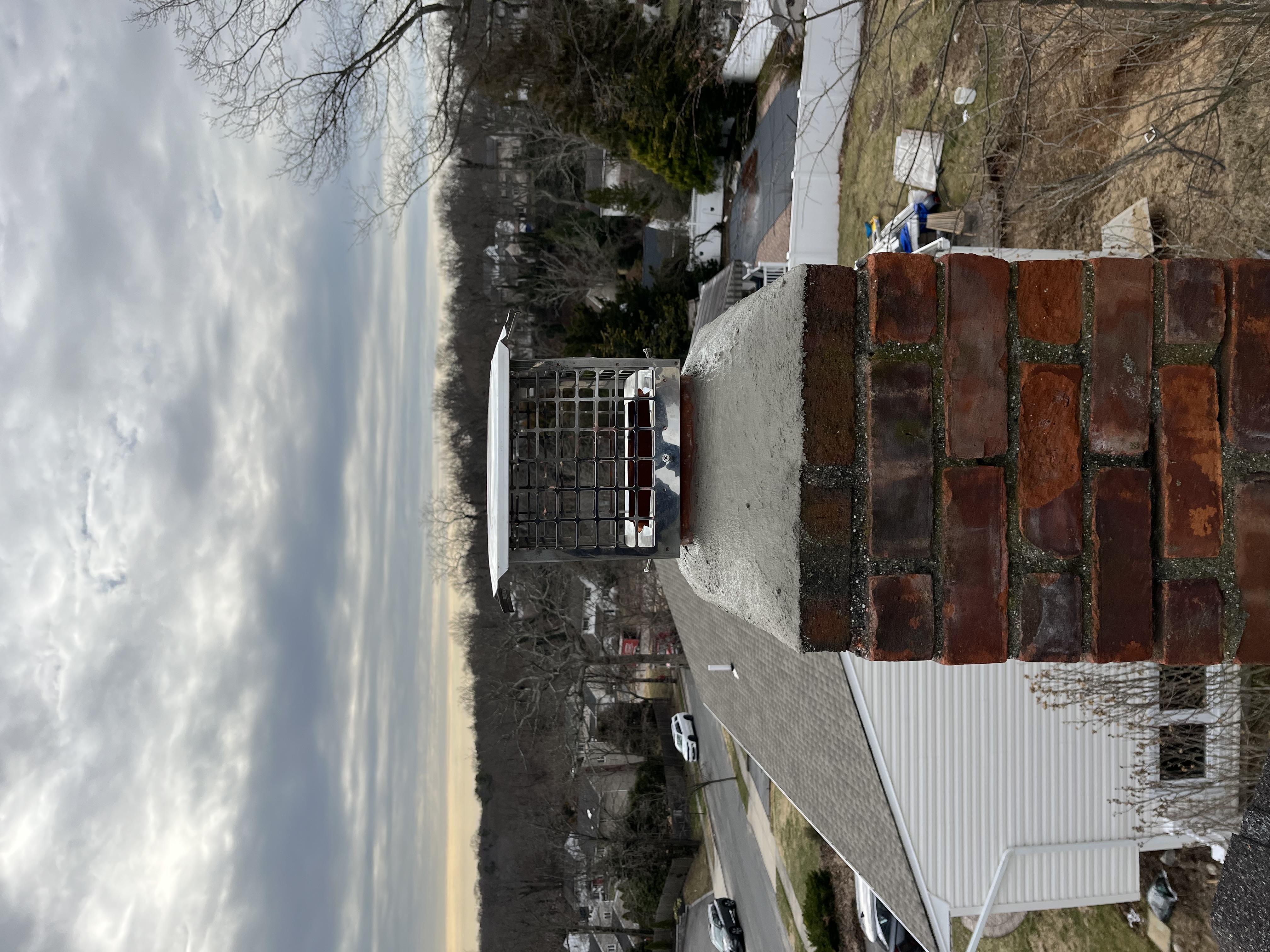 Completed flue repair with new cap and fresh cement crown